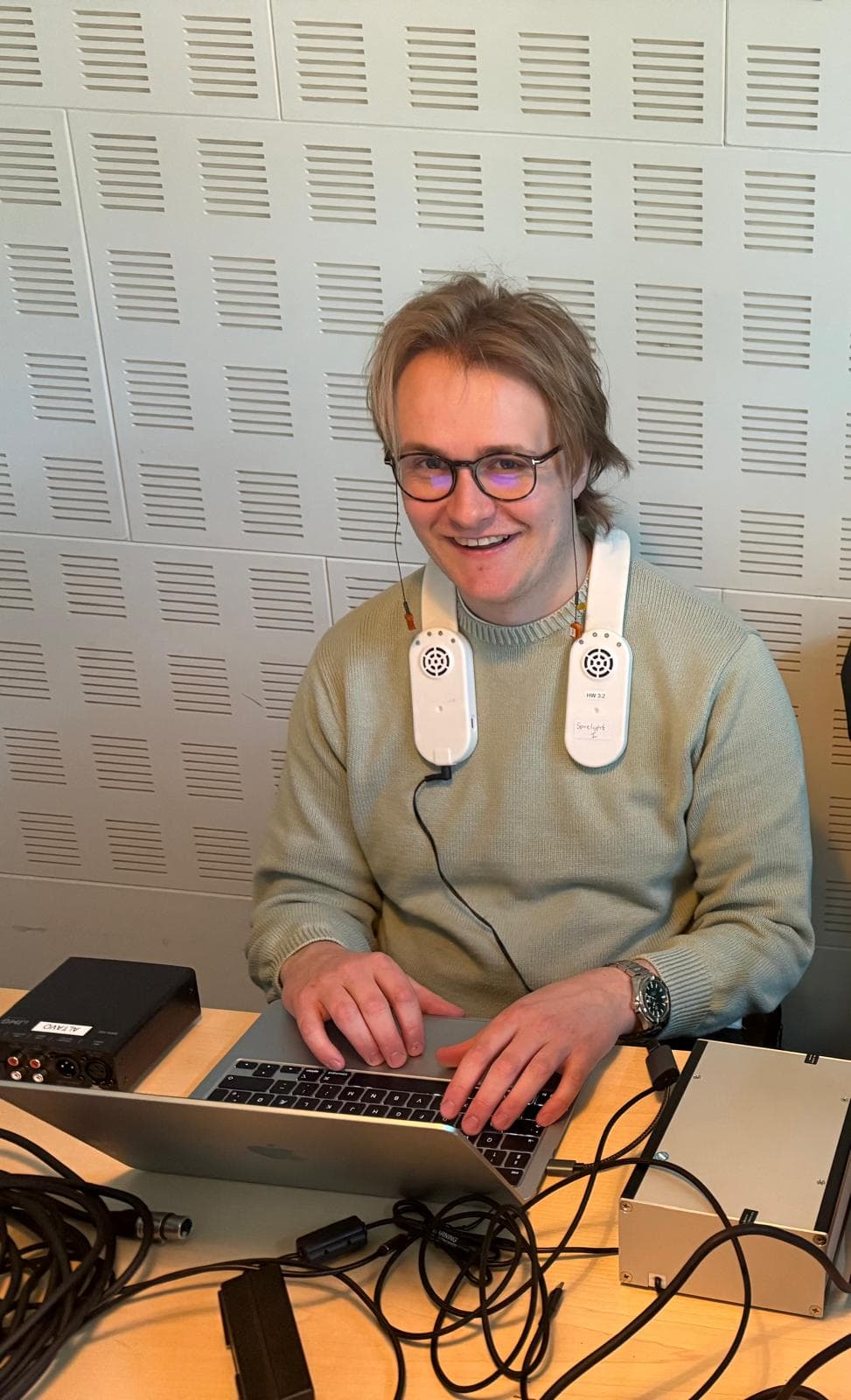 Participant reading a story with sensors on their mouth